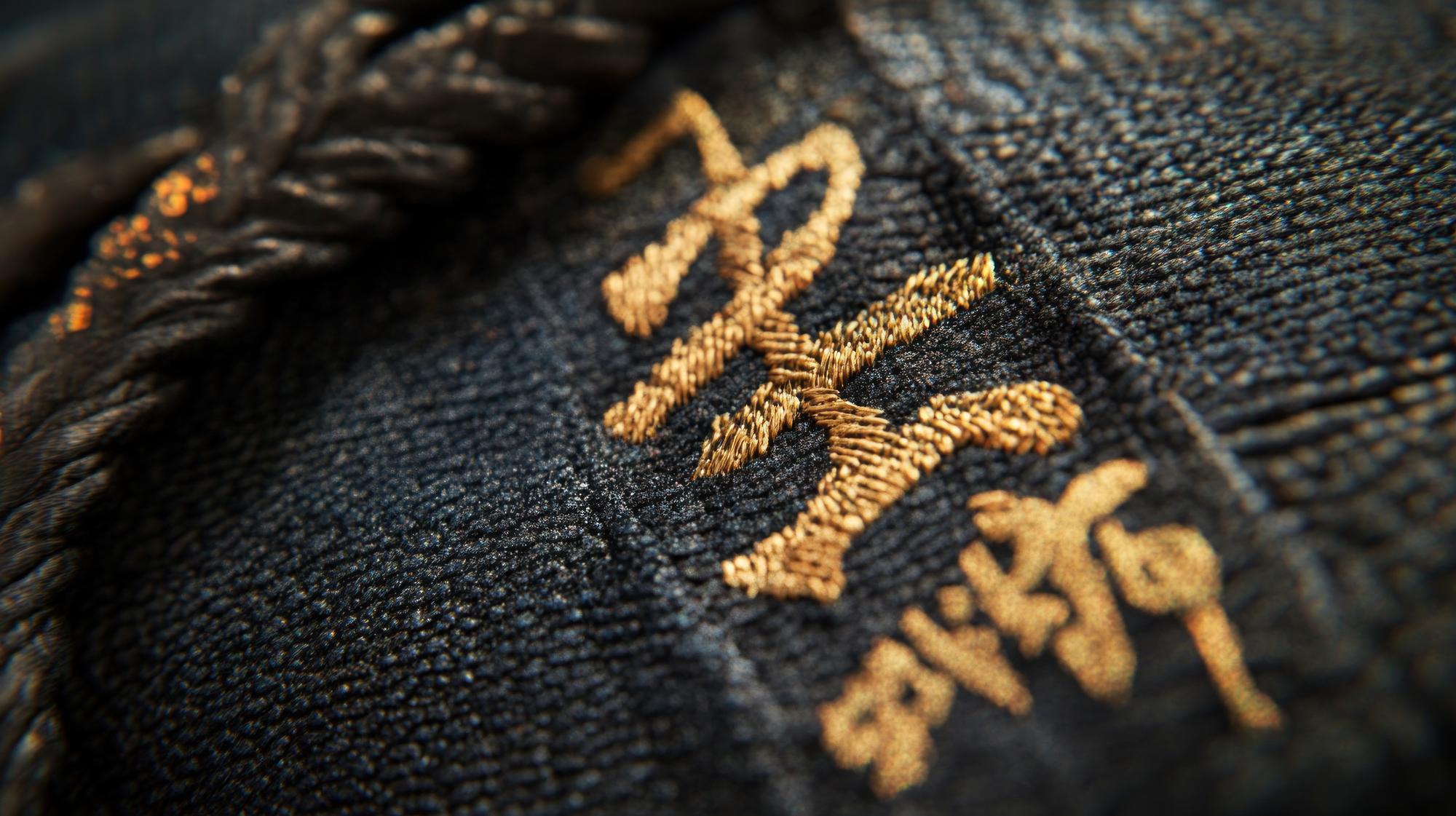 luxury embroidered textile with gold thread